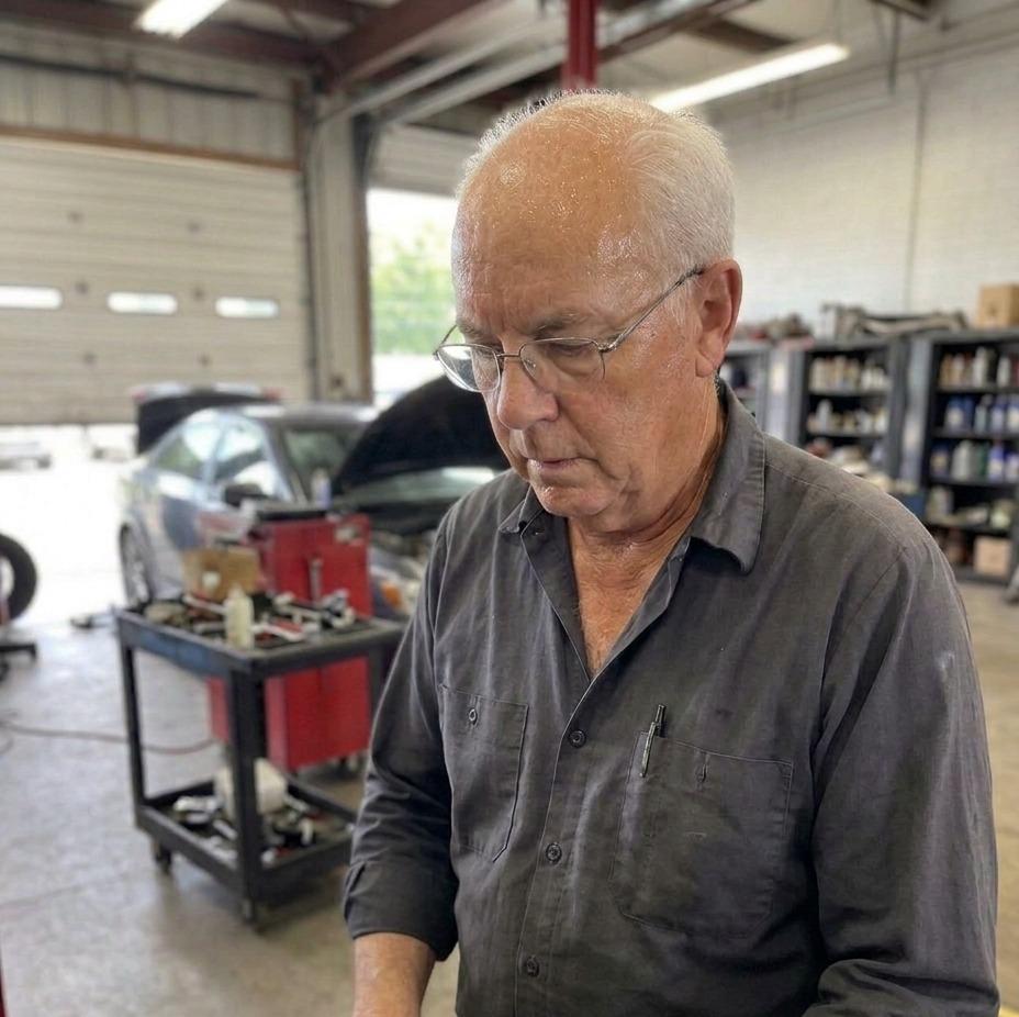 Diesel technician working in a heavy-duty repair shop